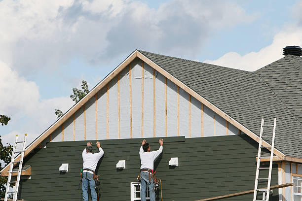 Professional Storm Damage Siding Repair technician working in Monmouth Junction, NJ
